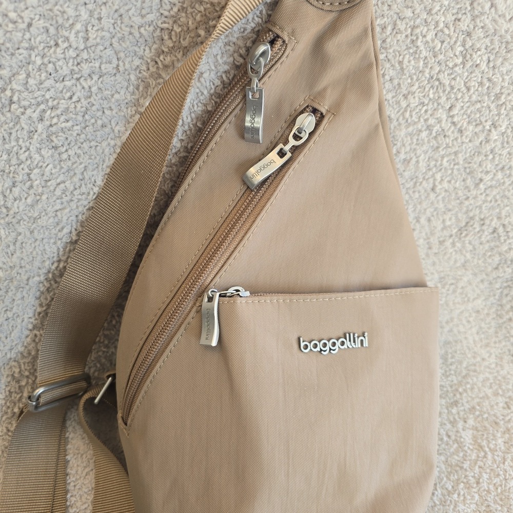 Baggallini Mini Sling Crossbody Bag Color Is Beach (Tan) Outdoor Hiking Travel - Picture 2 of 12